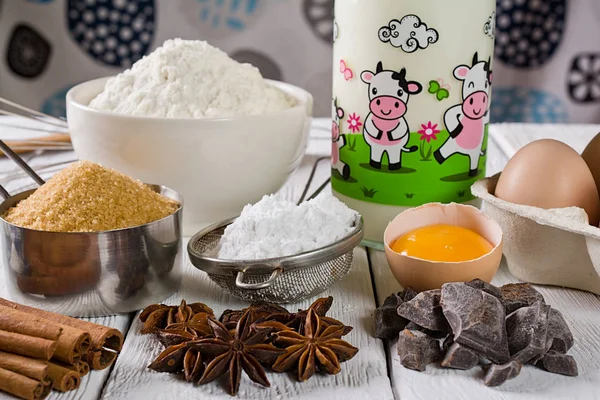 Ingredients for baking cake, on a wooden rustic background. — Stock Photo, Image