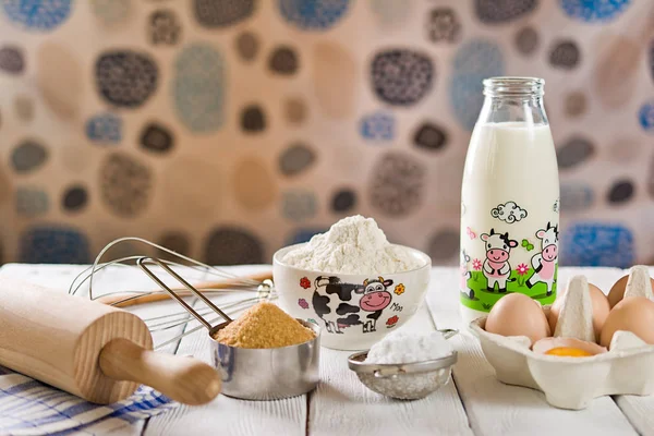 Ingredients for baking cake, on a wooden rustic background. — Stock Photo, Image