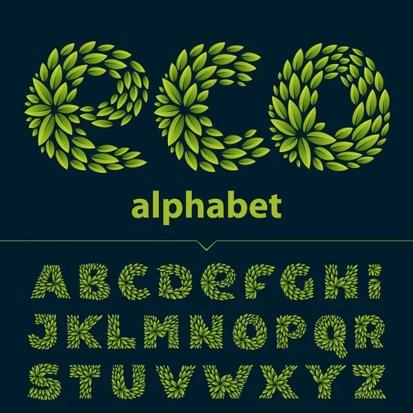 Alphabet logos formed by fresh green leaves. — Stock Vector