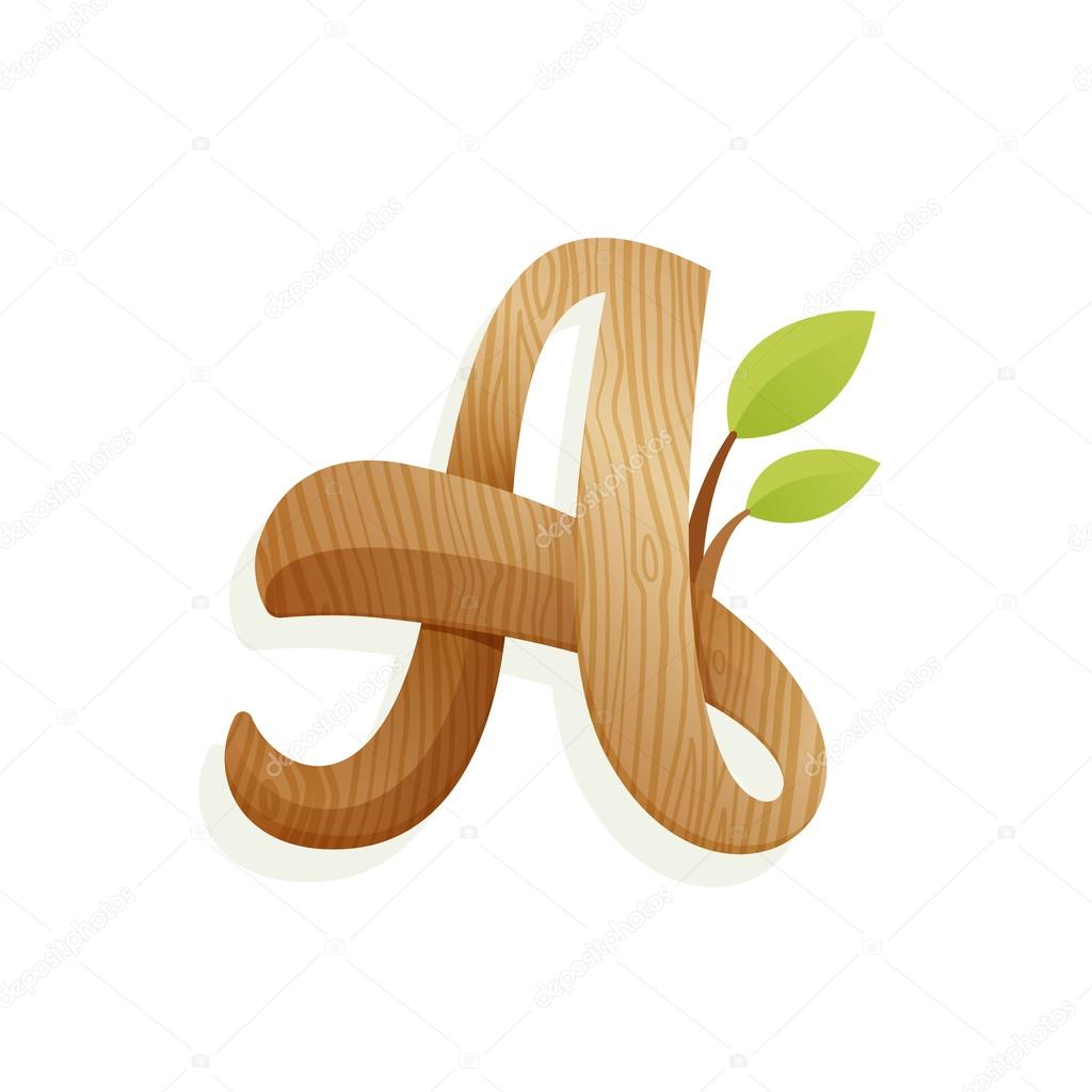 Letter A logo with wood texture and green leaves. 