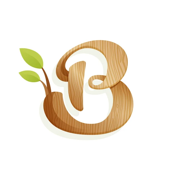Логотип буквы B с текстурой дерева и зелеными листьями . — стоковый вектор