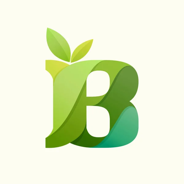 Snurrande bokstav B logotyp med gröna blad. — Stock vektor