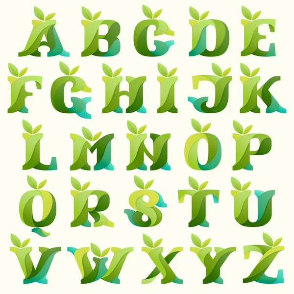 Alphabet tourbillonnant aux feuilles vertes . — Image vectorielle