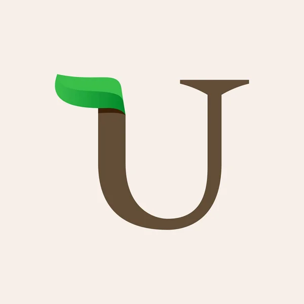Ecology U serif letter logo with green leaf. — Stock Vector