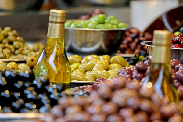 Olives, fruit in bowls cooked for consumption