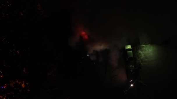 Car Burning Gasoline Dripping Burning Unrecognizable Firefighter Spraying Water Foam — Stock Video