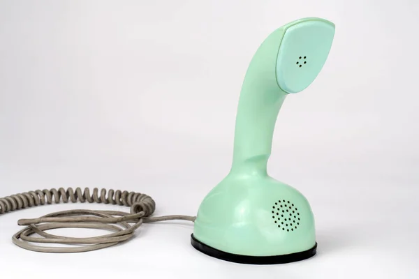 Gamla Retro telefon, ett stycke vredet på botten — Stockfoto