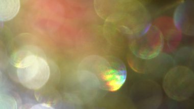 Işık patlaması ve parıltılı altın bokeh ışıklarının bulanık fotoğrafı. Arkaplan Olarak.