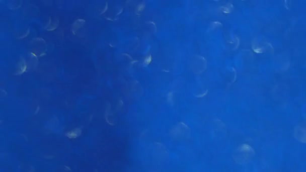 Photo abstraite floue de lumière éclate et paillettes lumières bokeh dorées. Comme toile de fond .