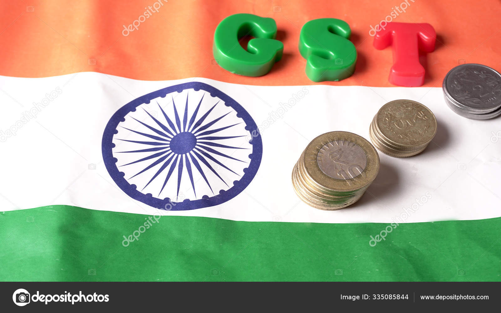 Gst概念Gst字母表和印尼盾币有印度国旗背景商业和金融印度投资储蓄和腐败问题——图库图片© rakshashelare #335085844