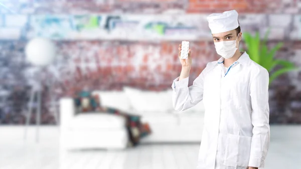 Beautiful medical woman doctor in uniform. Studio painted background. Concept of profitable health care. — Stock Photo, Image