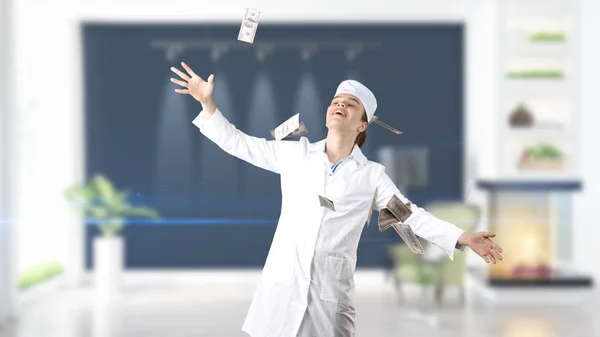 Beautiful medical woman doctor in uniform. Studio painted background. Concept of profitable health care. — Stock Photo, Image