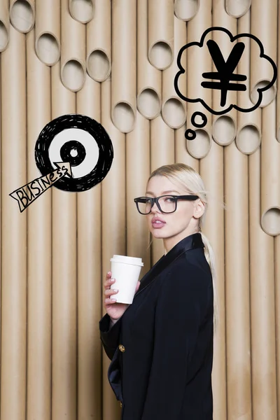 Thinking woman looking up on money sign in bubble and sketch target. Money concept on design background with lamps. — Stock Photo, Image