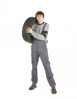 Çalışma gri siyah tekerlek ile Tekdüzen genç brunet ustabaşı.