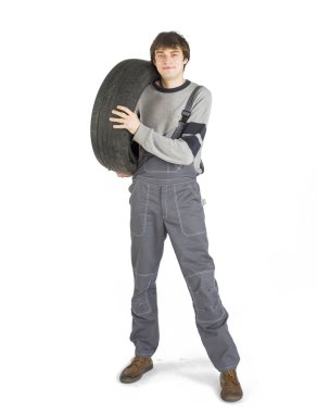 Çalışma gri siyah tekerlek ile Tekdüzen genç brunet ustabaşı.