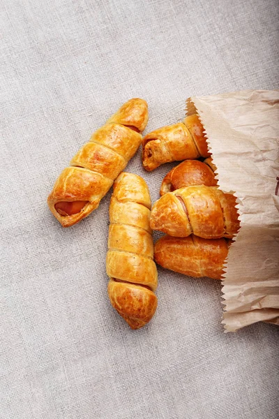 Sausage in the dough, close up — Stock Photo, Image