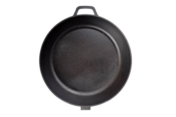 A cast-iron frying pan isolated — Stock Photo, Image