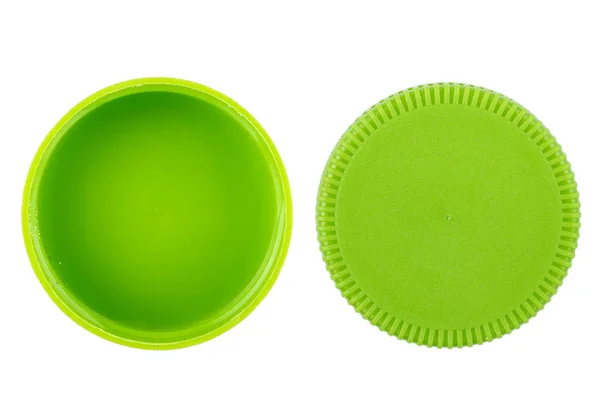 Зелене пластикове покриття на білому фоні — стокове фото