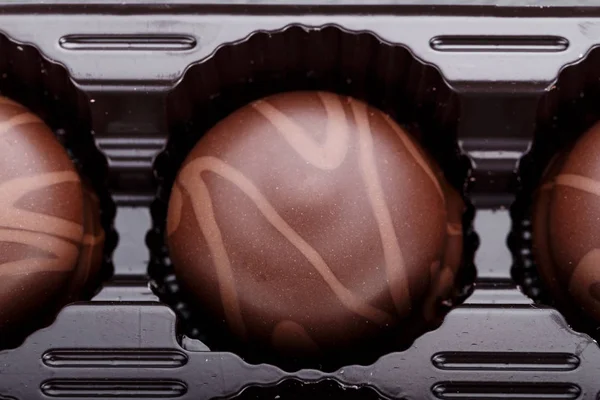 Cukierki czekoladowe z bliska — Zdjęcie stockowe