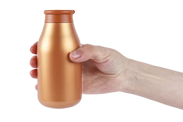 Бутылка с гелем для душа в руке — стоковое фото
