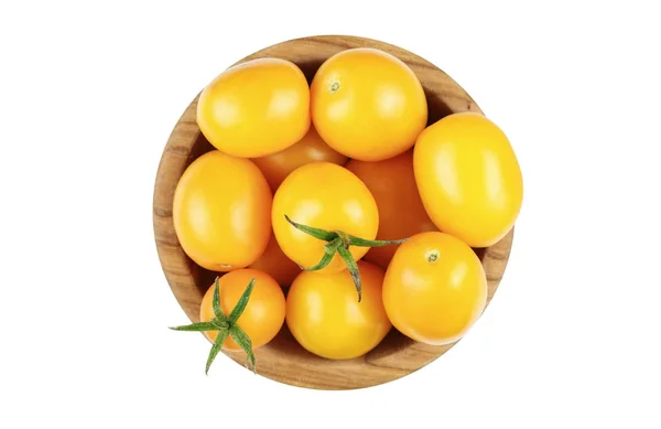 Желтые помидоры в изолированной пластине — стоковое фото