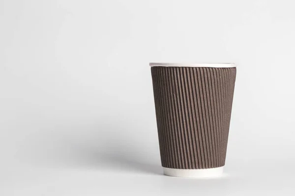 Un vaso de café sobre un fondo blanco — Foto de Stock