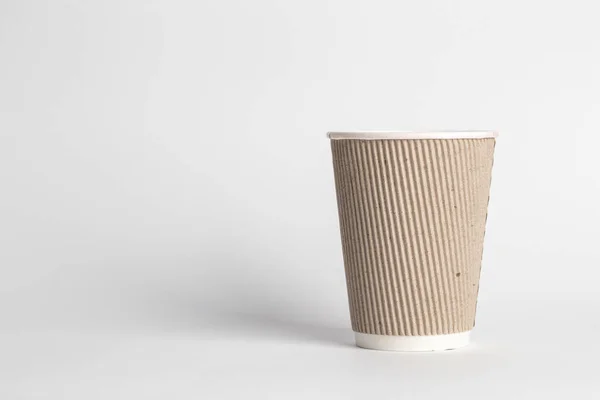 Una taza de café sobre un fondo blanco — Foto de Stock