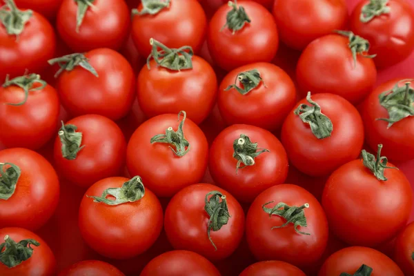 Fresh tomatoes. It can be used as background. (selective focus)