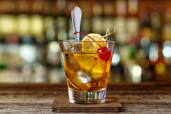 Old-fashioned cocktail on the bar