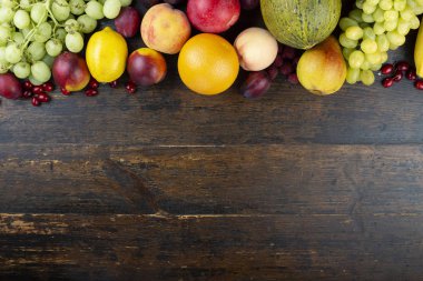 fresh fruit set on a wooden background