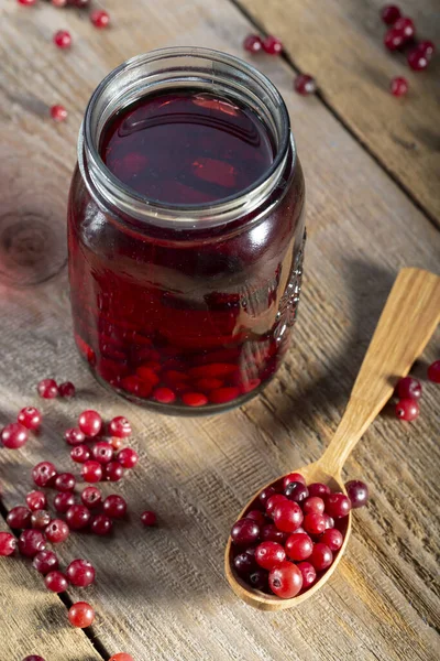 Delicious cranberry juice with whole cranberries. Healthy drink.