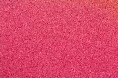 Kırmızı temizlik süngeri. Doku yakın. Hijyen kavramı.