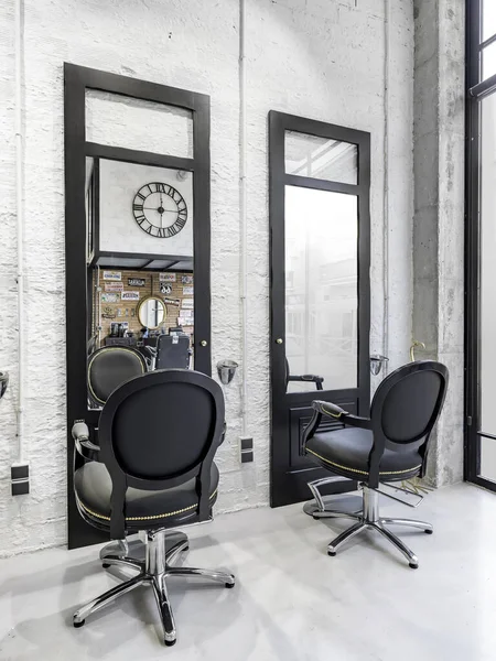 Chairs in a retro beauty salon. Hair salon and make up store, barber shop and manicure interior business