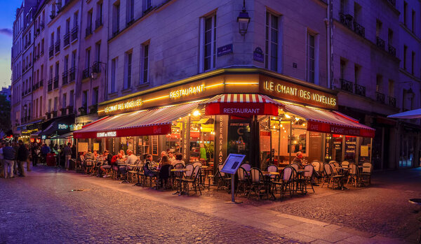 Paris, France. Circa October 2019. People in cafes and restaurants in the streets of Paris