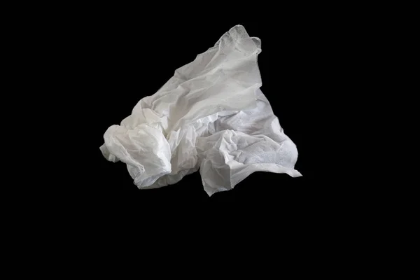 Użyto przykręconej tkanki papierowej na ciemnym tle. Koncepcja bezwartościowa. — Zdjęcie stockowe