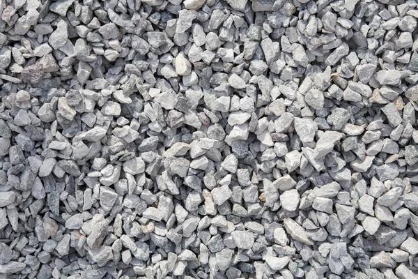 Crushed stone texture background. Crushed stone construction materials.