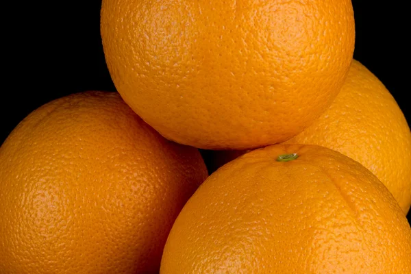 Stack of Oranges on a Black Background — Stock Photo, Image