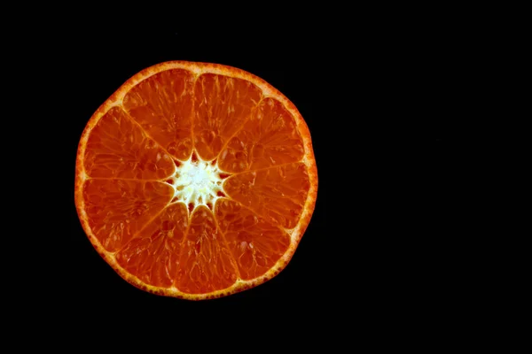 Half Cut Orange on a Black Background — Stock Photo, Image