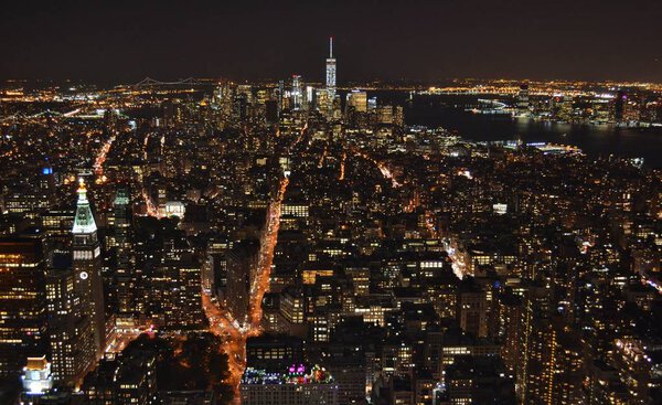 Midtown Manhattan and Downtown Manhattan in New York City at night.