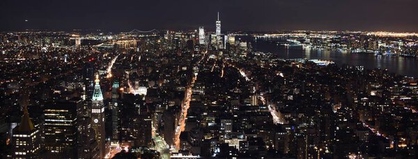 The skyline of midtown and downtown New York City at night.