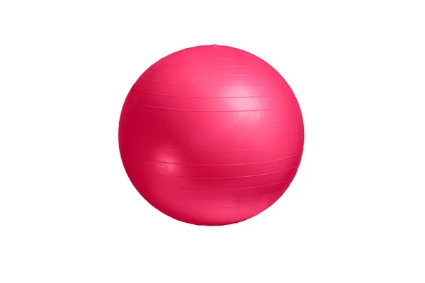 Close up de uma bola de fitness rosa isolada no fundo branco — Fotografia de Stock