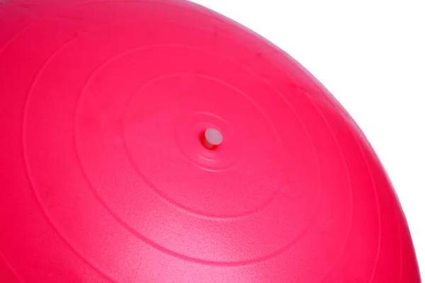 白い背景に分離されたピンク フィットネス ボールのクローズ アップ — ストック写真