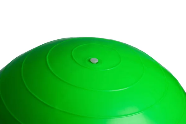 Primer plano de una pelota de fitness verde aislada sobre fondo blanco — Foto de Stock