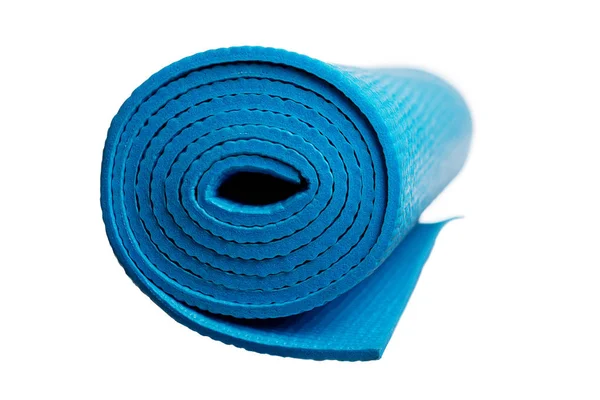 Esterilla de yoga azul sobre un fondo blanco — Foto de Stock