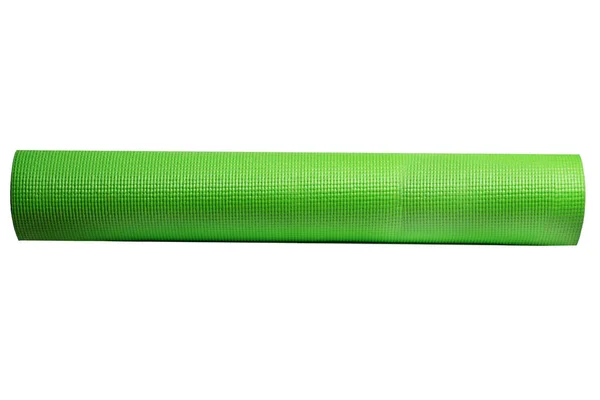 Esterilla de yoga verde sobre un fondo blanco — Foto de Stock