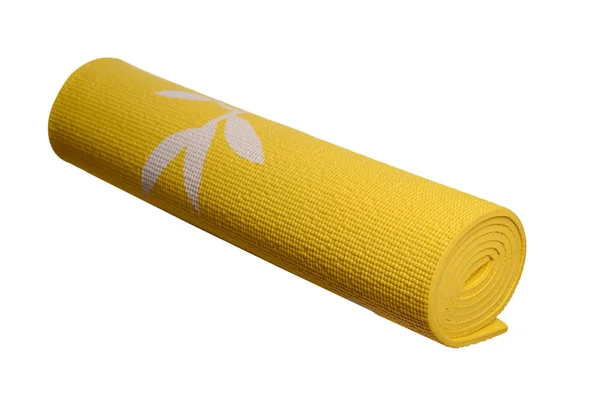 Esterilla de yoga amarillo sobre un fondo blanco — Foto de Stock