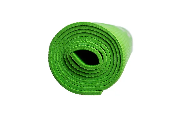 Esterilla de yoga verde sobre un fondo blanco — Foto de Stock