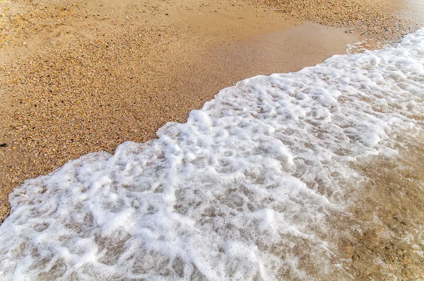 小さな泡の海の波は、背景を閉じる — ストック写真