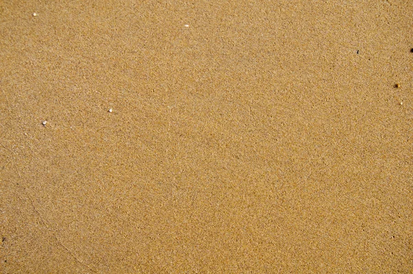 Nahaufnahme von Sand Textur eines Strandes Hintergrund — Stockfoto