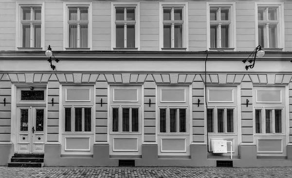 Black and white building with windows